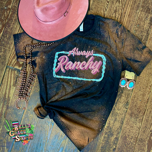 black tee with bleached detail. says "always ranchy" in pink and turquoise rectangle around it 